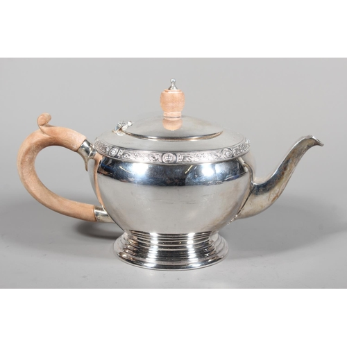 27 - Four piece silver tea service on matching tray, with Lindisfarne border decoration and stamp to base... 