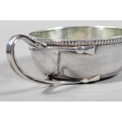 29 - Sterling silver porringer with single loop handle, beaded edge border and glass liner, Guild of Hand... 