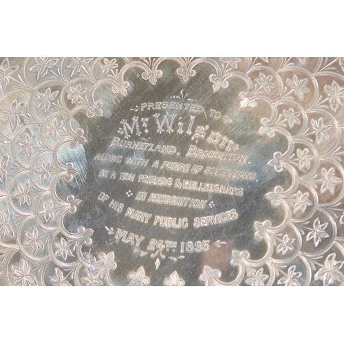 6 - Victorian silver salver with heavy foliate decoration and raised on tripod feet,&nbsp;Hamilton, Cric... 