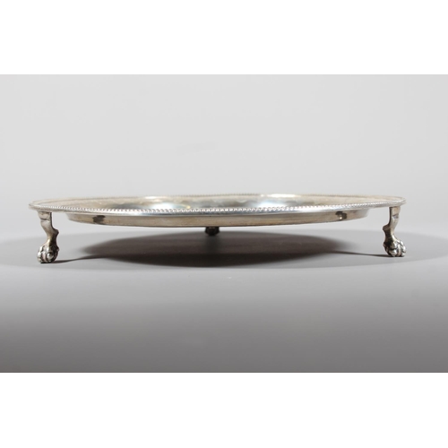 6 - Victorian silver salver with heavy foliate decoration and raised on tripod feet,&nbsp;Hamilton, Cric... 