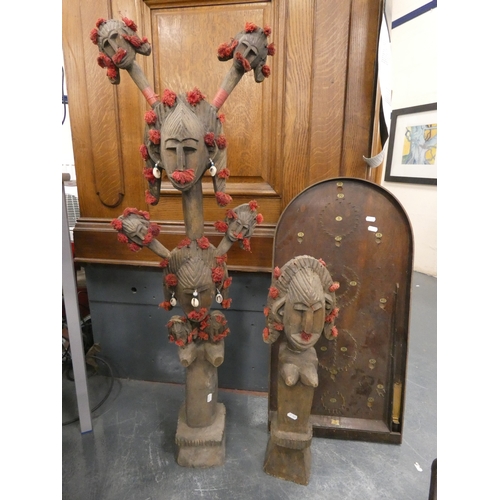 Group of wooden African tribal figures, magazine rack modelled as an ...