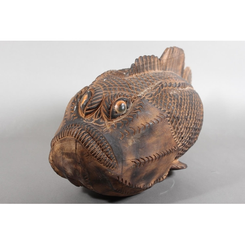 1 - Heavily carved wooden fish model....