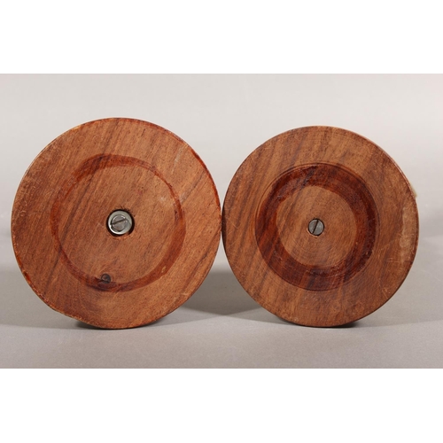 100 - Pair of brass musical figures on hardwood stands.