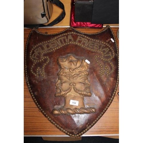 112 - Vintage wall mountable coat-of-arms depicting a double-headed figure with studded border.