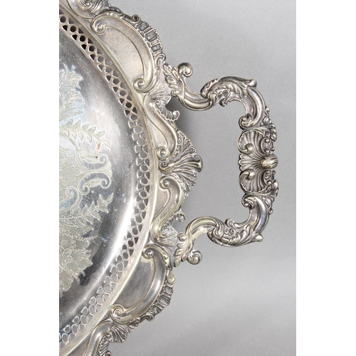 12 - Silver-plated twin-handled scroll and foliate decorated tray with pierced gallery....