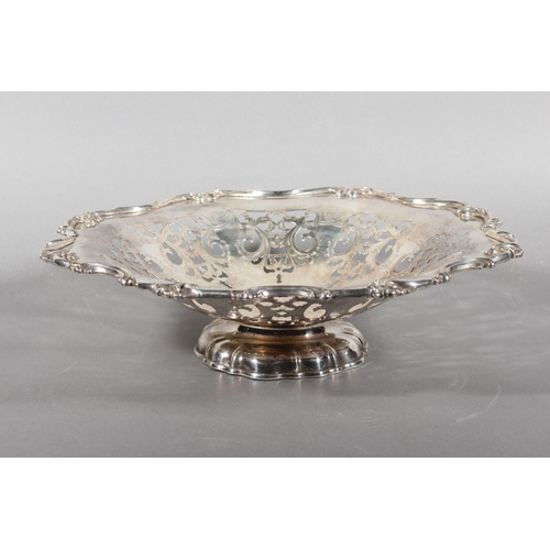 16 - Silver-plated centrepiece with pierced body and scrolling border....