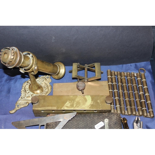 29 - Scientific instruments, a brass ships' gimbal, candlesticks, an antique suppository mould, etc....