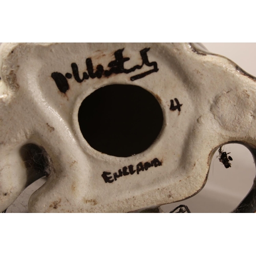 4 - Two Winstanley cat models and a Staffordshire cat model....