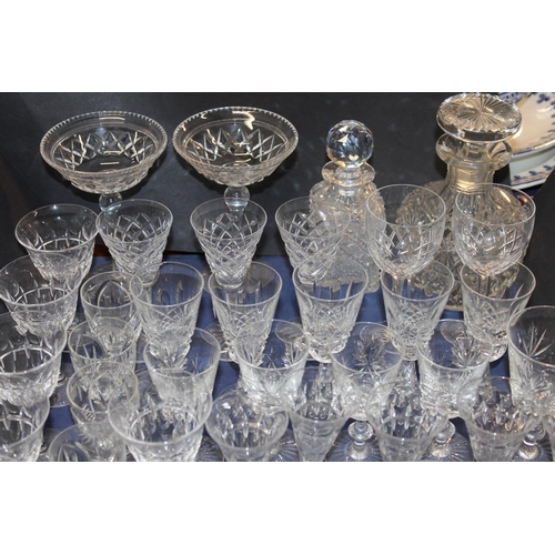 51 - Glassware to include decanters, champagne flutes, bowls, and other glasses....