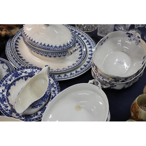 62 - Blue and white ceramics to include an ashet, tureens, side dishes, sauceboats, an hexagonal bowl, et... 