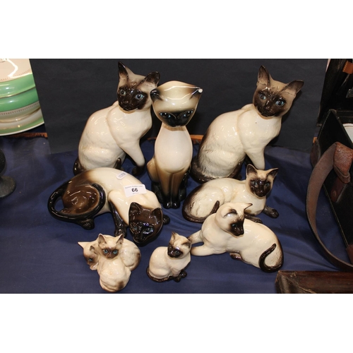 66 - Royal Doulton, and other, Siamese cat models.