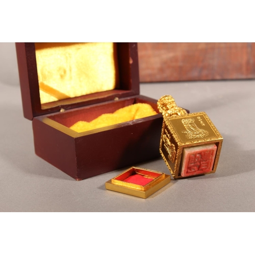 7 - Repoussé hand beaten Thai panel depicting figures and an oriental reproduction seal in case....