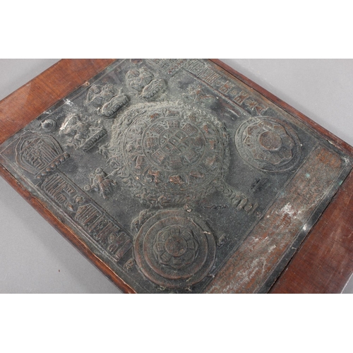 7 - Repoussé hand beaten Thai panel depicting figures and an oriental reproduction seal in case....