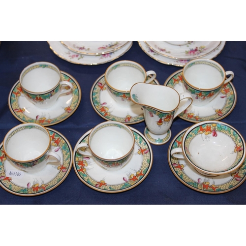 72 - Hammersley floral decorated tea for two, a set of Royal Doulton cups and saucers, and a jug.