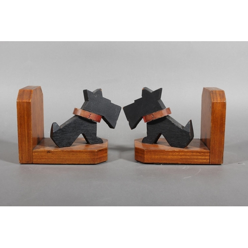 77 - Art Deco style wooden bookends with black Scottie Dog mounts.