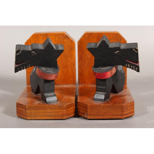 77 - Art Deco style wooden bookends with black Scottie Dog mounts.
