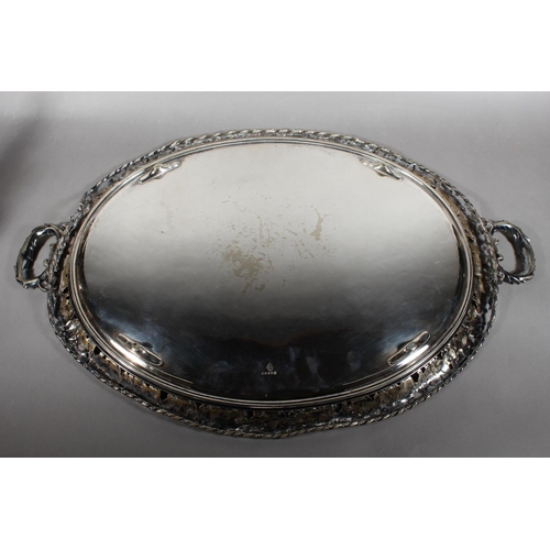 8 - Silver-plated twin-handled tray with foliate border and decoration....