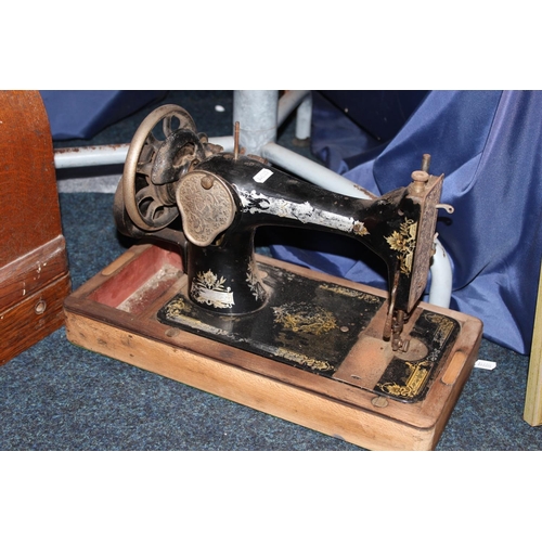 81 - Cased Singer sewing machine and another