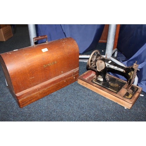 81 - Cased Singer sewing machine and another