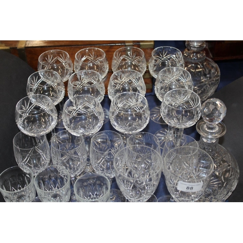 88 - Two glass decanters, hop glasses, tumblers, and others.