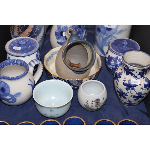 89 - Blue and white to include Buchan ware, South Lissens Pottery, a Whistlestop Pottery crock, etc.