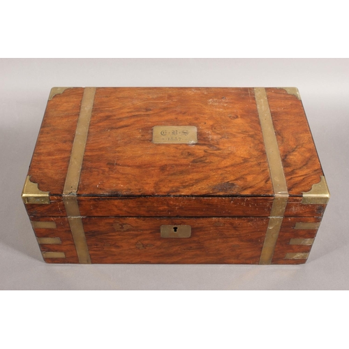 99 - Victorian walnut and brass-bound writing slope.
