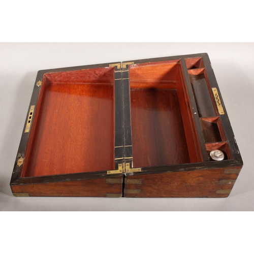 99 - Victorian walnut and brass-bound writing slope.