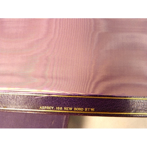 49 - Album - Thoroughbred Horses. A fine oblong quarto album in purple morocco for Asprey & outer box... 