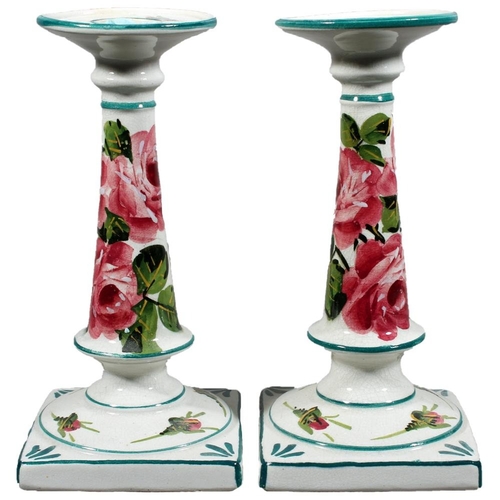 Pair of Wemyss pottery candlesticks on square bases with Cabbage Rose decoration, 18cm tall.