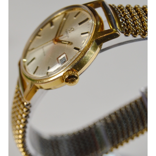 20 - Omega Genève gent's wristwatch, c. early 1970s, with gold-coloured bezel, silvered dial, baton indic... 