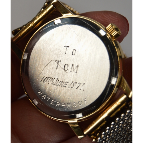 20 - Omega Genève gent's wristwatch, c. early 1970s, with gold-coloured bezel, silvered dial, baton indic... 