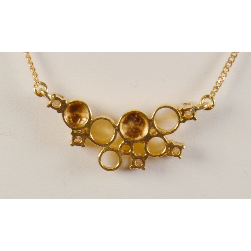 33 - Diamond pendant set with five small brilliants, unmarked, on a fine 18ct gold chain, '750', 4g gross... 
