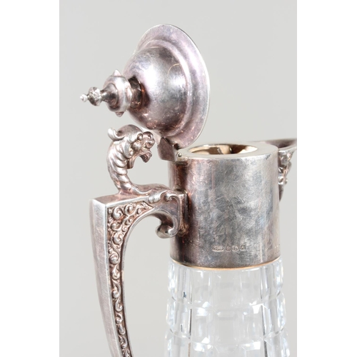 57 - Modern silver topped cut glass ewer, the hobnail body mounted with mythical beast, Roberts & Bel... 
