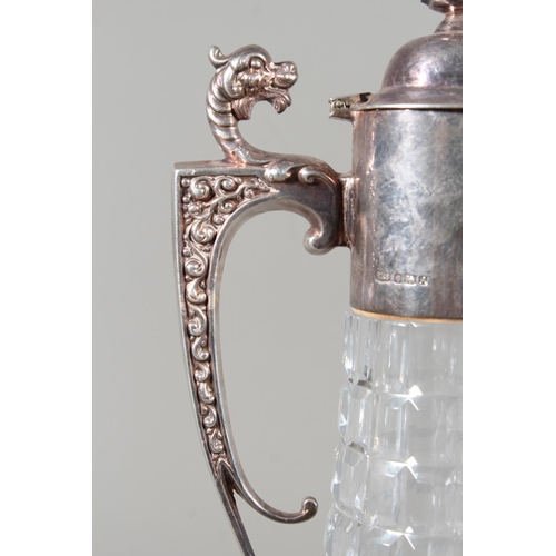 57 - Modern silver topped cut glass ewer, the hobnail body mounted with mythical beast, Roberts & Bel... 