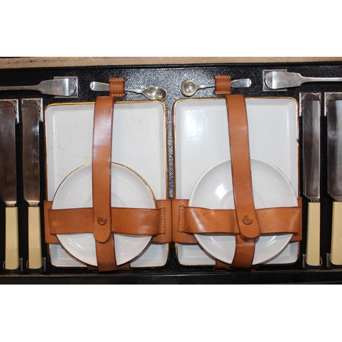 68 - Vintage travelling picnic set in suitcase.