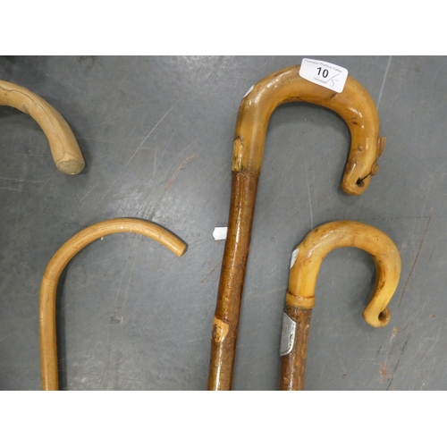 10 - Five walking sticks to include examples with horn handles.  (5)...