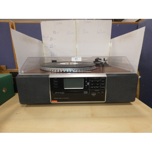 11 - Neostar music system with turntable, radio and CD recorder, model TCTR-30C....