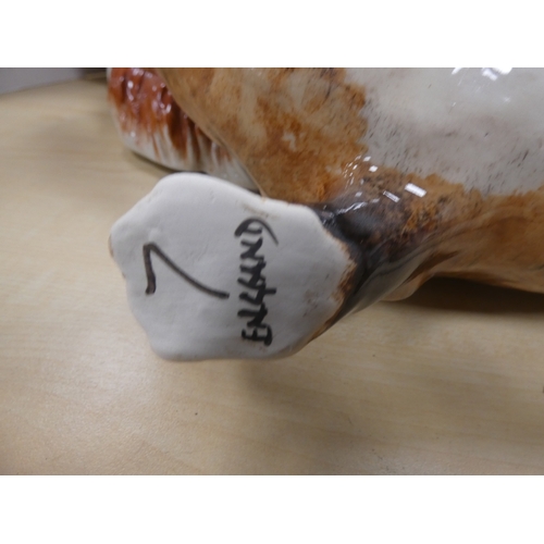 13 - Pair of Bo'ness lions (eyes lacking), pair of Staffordshire dogs and a fox with amber-coloured bead ...