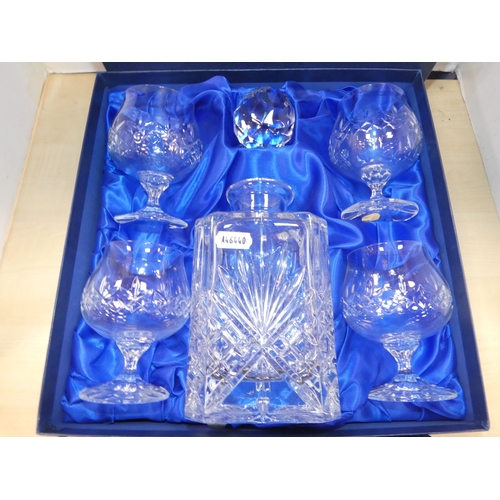 20 - Bohemia Crystal decanter and four glasses, in fitted box, and a boxed set of Gleneagles Crystal glas...