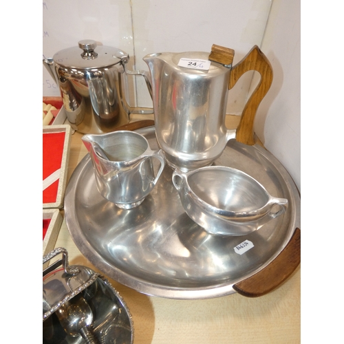 24 - EP to include fish knives and forks, teaspoons, Picquot ware teapot, tray, coffee pot etc....