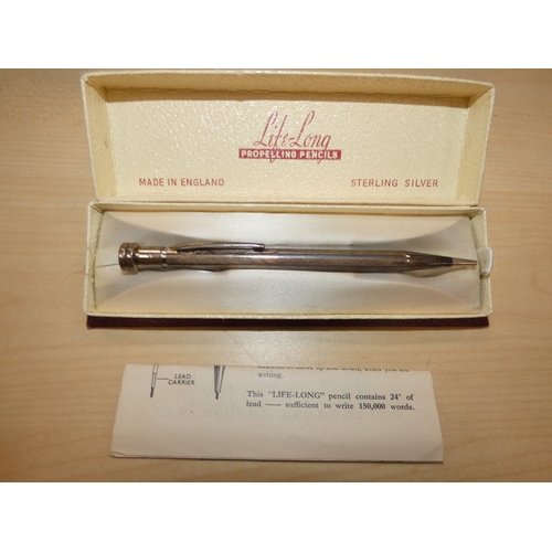 26 - Curios to include a circular wall barometer, flask, lighter, silver propelling pencil etc....