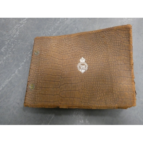 31 - Carton containing a chinoiserie table lamp, books, armorial plaques, postcard album etc....