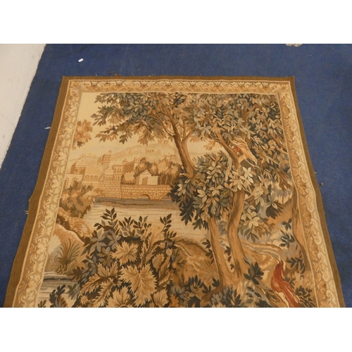 Machine-made tapestry depicting a landscape scene with town to the ...