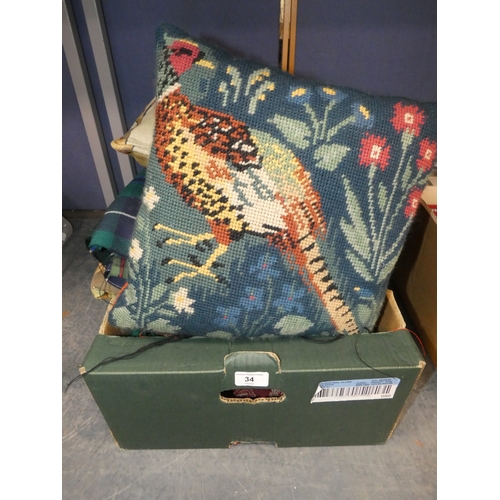 34 - Carton containing fabric and cushions....