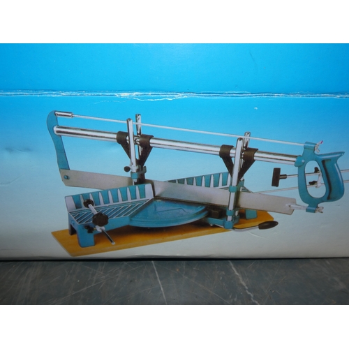 36 - Precision mitre box and saw, and a Stanley plane, both boxed....