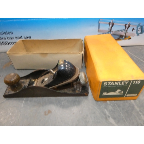 36 - Precision mitre box and saw, and a Stanley plane, both boxed....