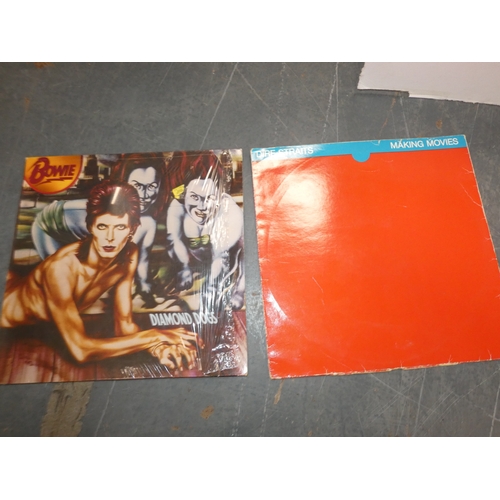 37 - Two cartons containing rock and pop vinyl records to include Led Zeppelin, Talking Heads, Dire Strai...