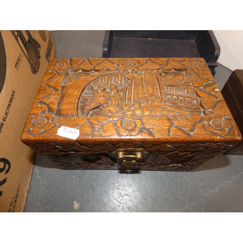 46 - Carton containing carved camphorwood portable box, 19th century mother of pearl inlaid tea caddy, pi...