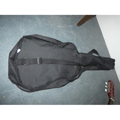 47 - Encore acoustic guitair, model ENC340FT, in carry case, and a guitar wall hook....