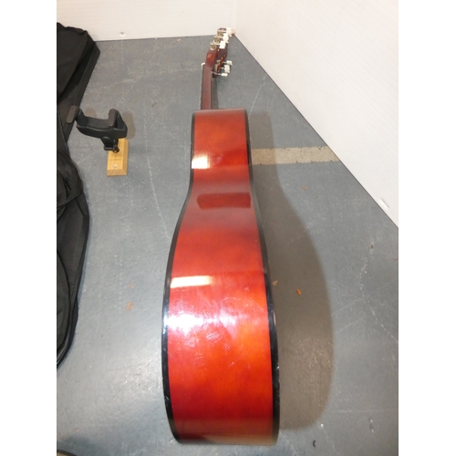 47 - Encore acoustic guitair, model ENC340FT, in carry case, and a guitar wall hook....